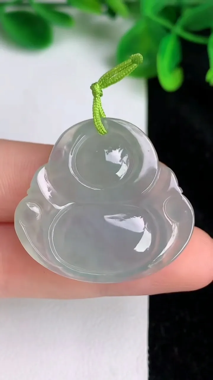 天然A货翡翠冰种飘花佛公吊坠，尺寸30-33-6，重量:8.48g
6月20日