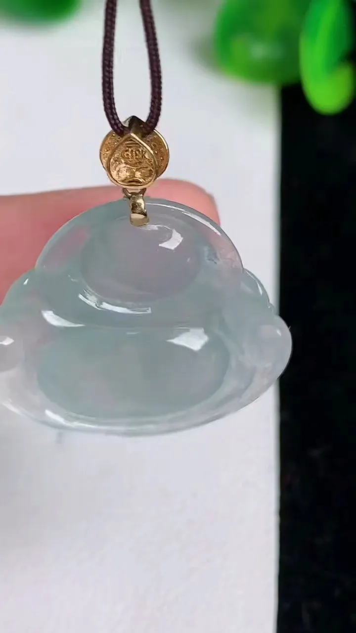 天然A货翡翠种飘花佛公吊坠，尺寸23.5-27.5-5.8，重量:5.73g
6月21日