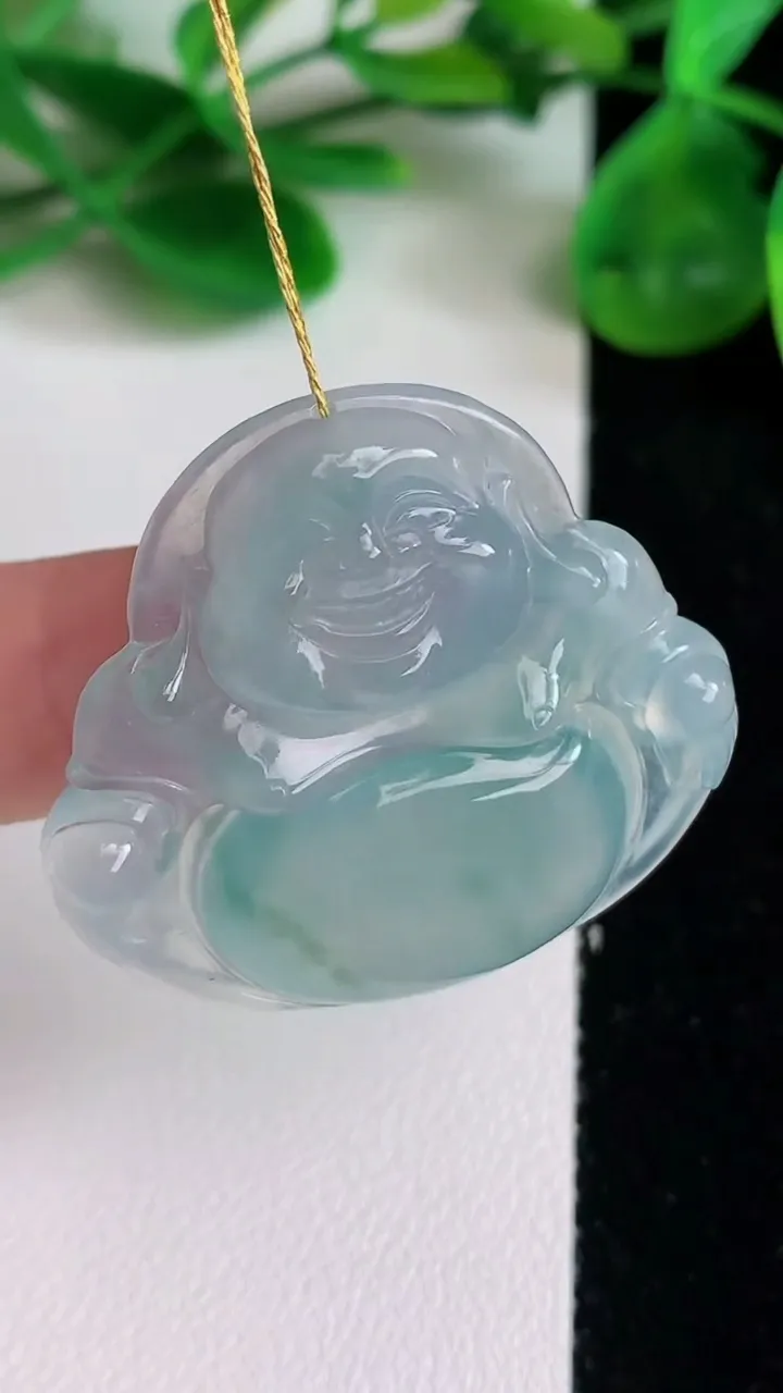 天然A货翡翠种飘花佛公吊坠，尺寸33.2-35.6-5.6，重量:9.45g
6月22日