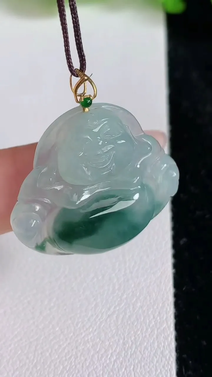 天然A货翡翠种飘花佛公吊坠，尺寸25.5-29.3-6，重量:6.64g
6月24日