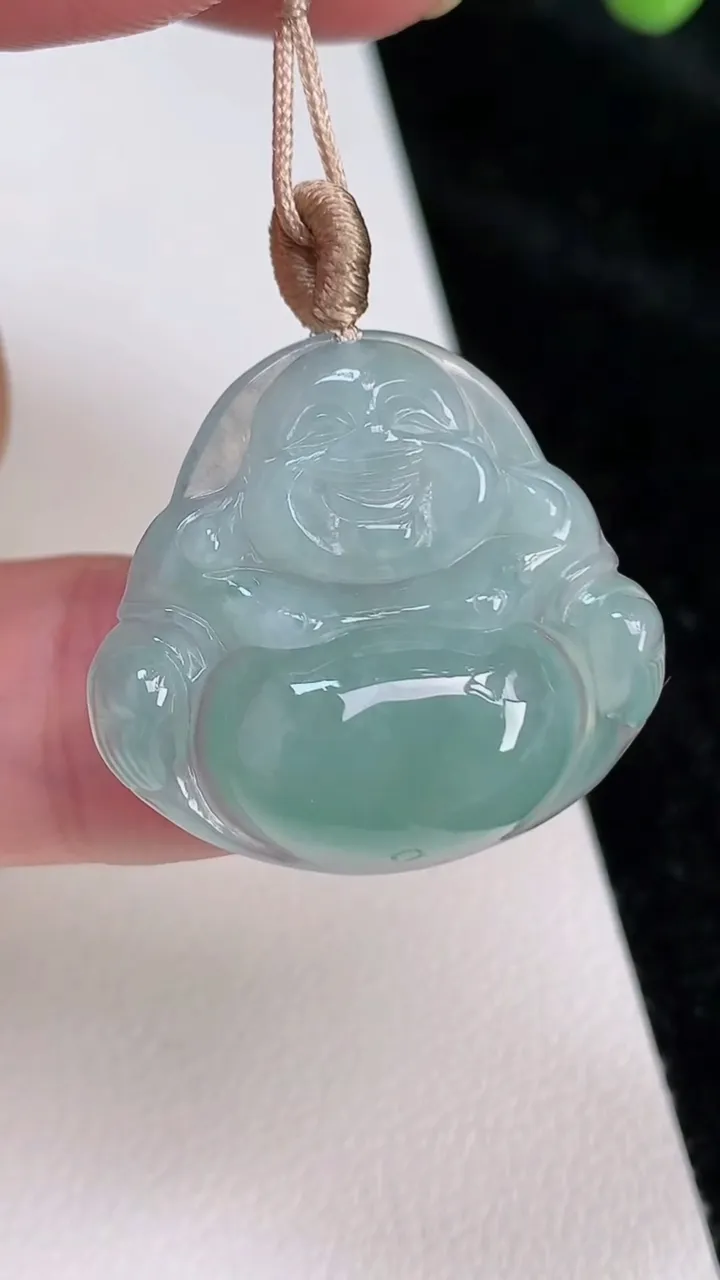 天然A货翡翠飘花佛公吊坠，尺寸24.4-26.5-5.8，重量:5.64g
6月27日