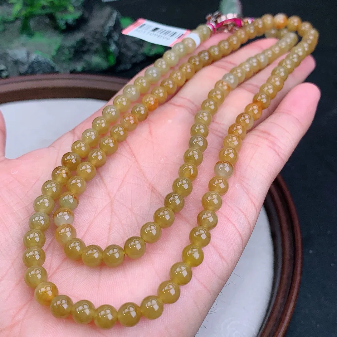 天然A货翡翠黄翡圆珠项链
尺寸6.2mm   重47.76g