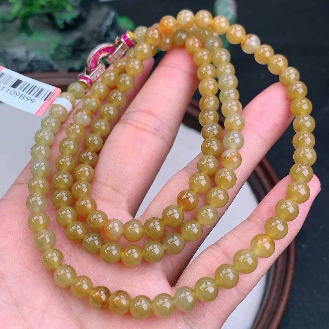 天然A货翡翠黄翡圆珠项链
尺寸6.2mm   重47.76g