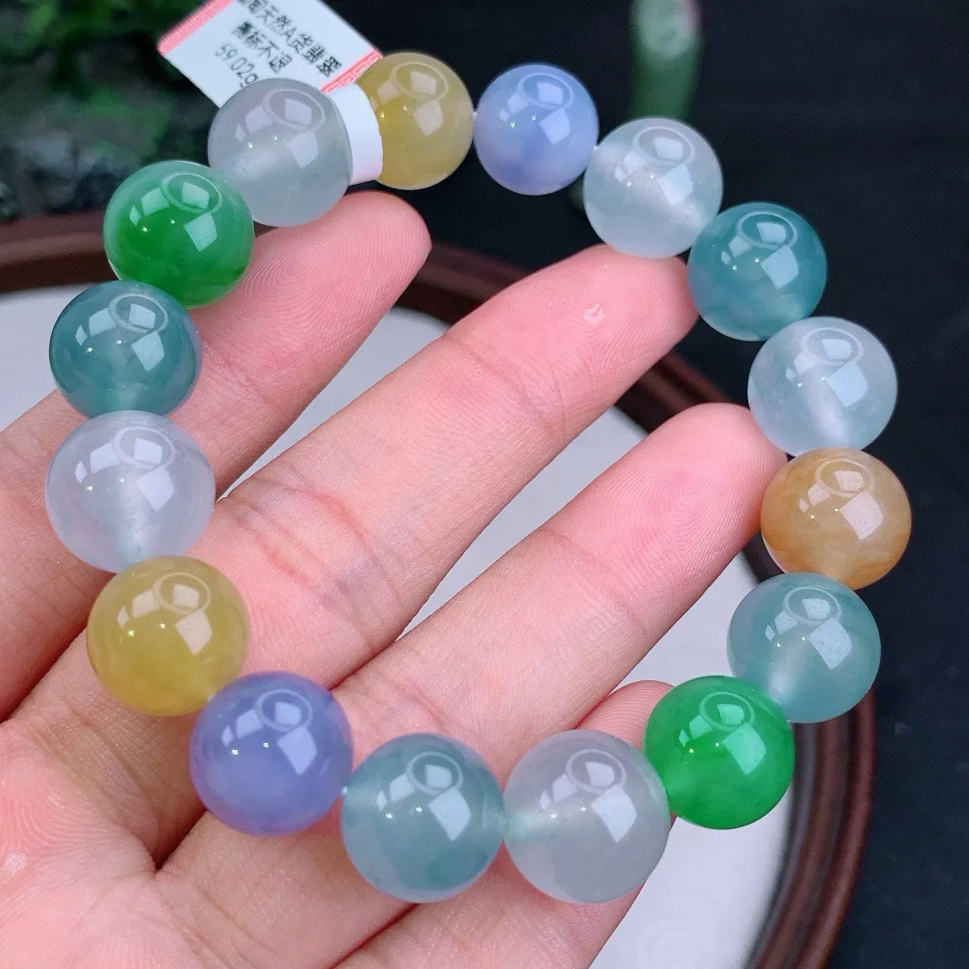 天然A货翡翠冰满色多宝起胶圆珠手串
尺寸12.8mm   重59.02g