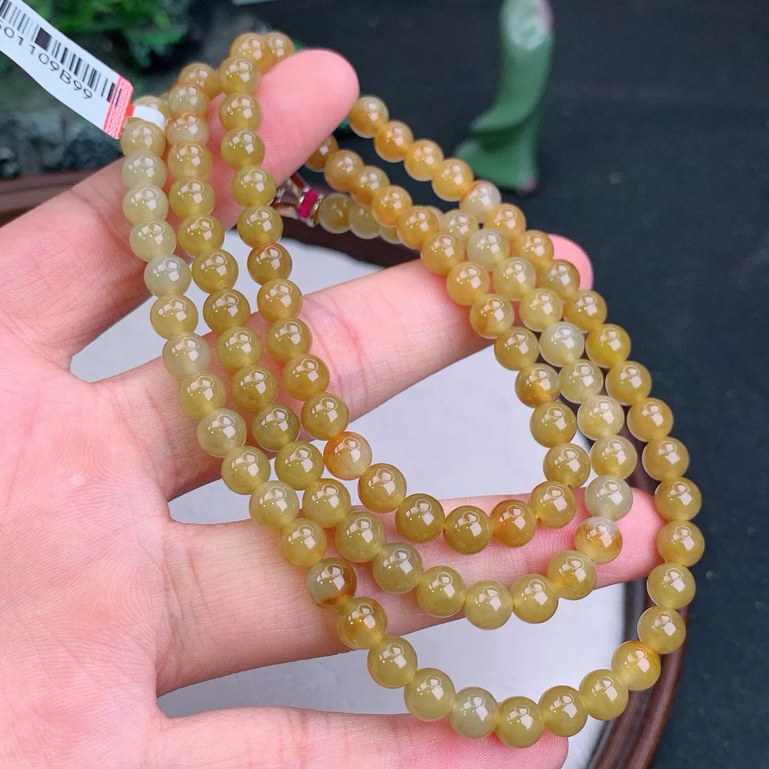 天然A货翡翠黄翡圆珠项链
尺寸6.2mm   重47.76g