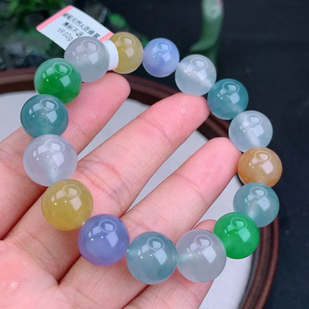 天然A货翡翠冰满色多宝起胶圆珠手串
尺寸12.8mm   重59.02g