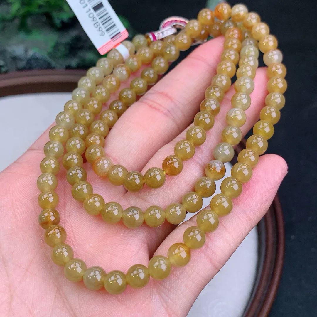 天然A货翡翠黄翡圆珠项链
尺寸6.2mm   重47.76g