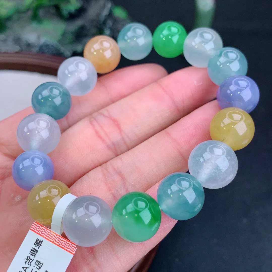 冰满色多宝起胶圆珠手串
尺寸12.8mm   重59.02g