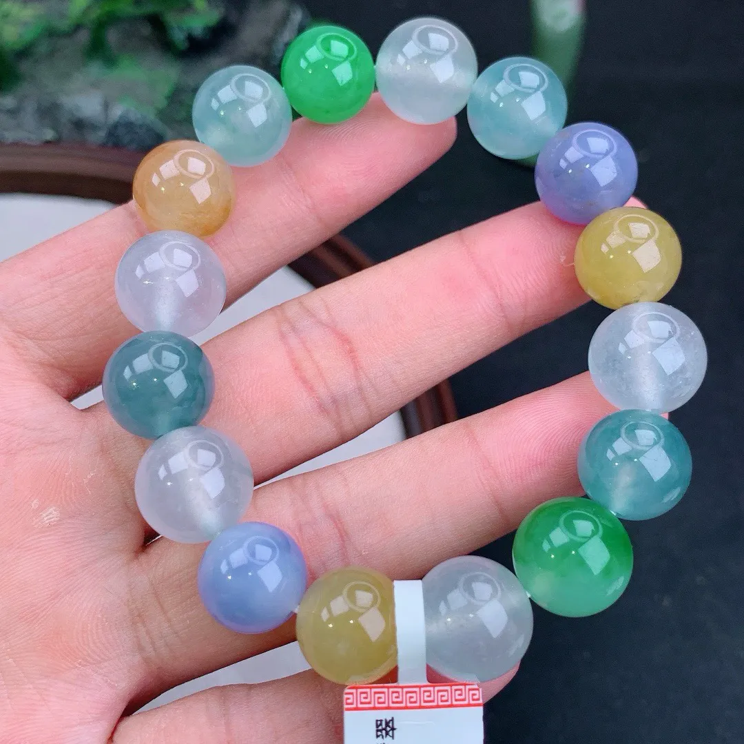 冰满色多宝起胶圆珠手串
尺寸12.8mm   重59.02g