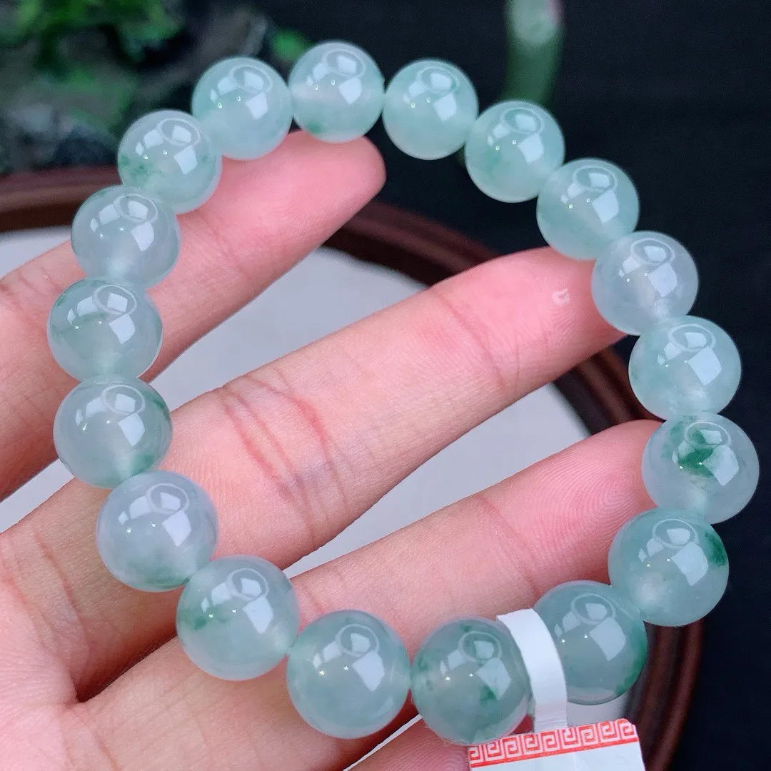 缅甸天然A货翡翠冰飘花圆珠手串
尺寸10.7mm   重41.02g