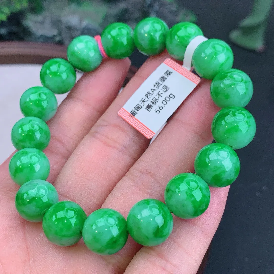 缅甸天然A货翡翠飘阳绿圆珠手串
尺寸12.4mm   重56.00g