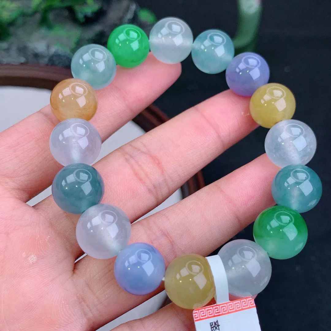 冰满色多宝起胶圆珠手串
尺寸12.8mm   重59.02g