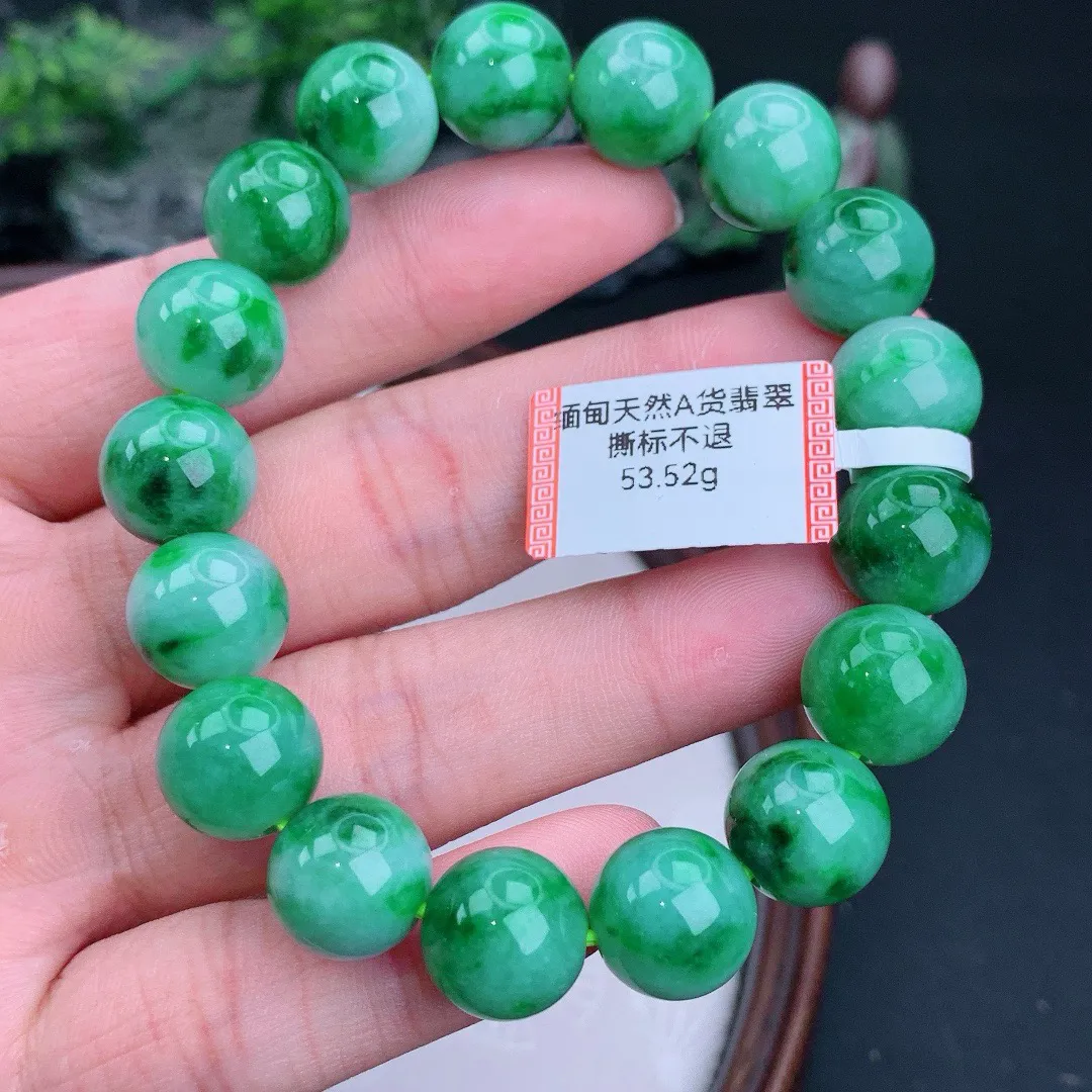 缅甸天然A货翡翠满绿圆珠手串
尺寸12mm  重53.52g