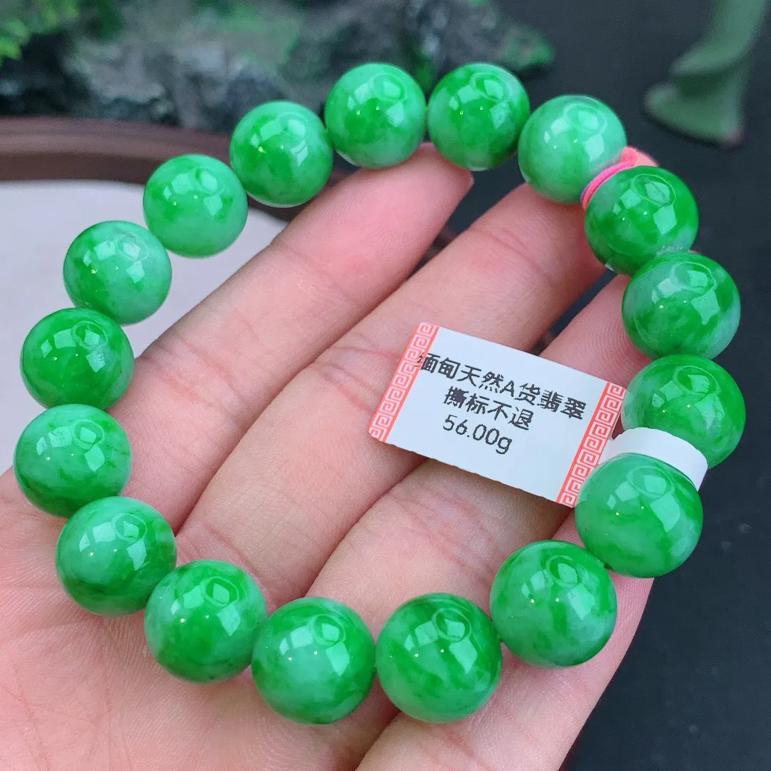 缅甸天然A货翡翠飘阳绿圆珠手串
尺寸12.4mm   重56.00g