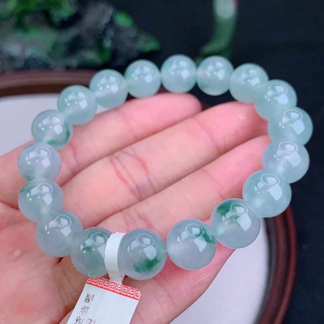 缅甸天然A货翡翠冰飘花圆珠手串
尺寸10.7mm   重41.02g