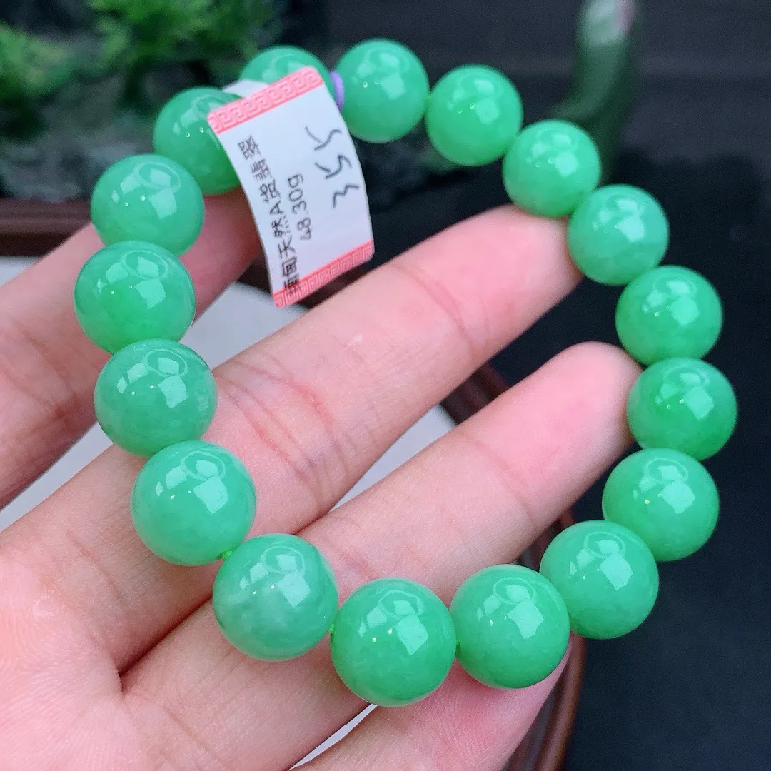 缅甸天然A货翡翠满绿圆珠手串 
尺寸11.6mm   重48.30g