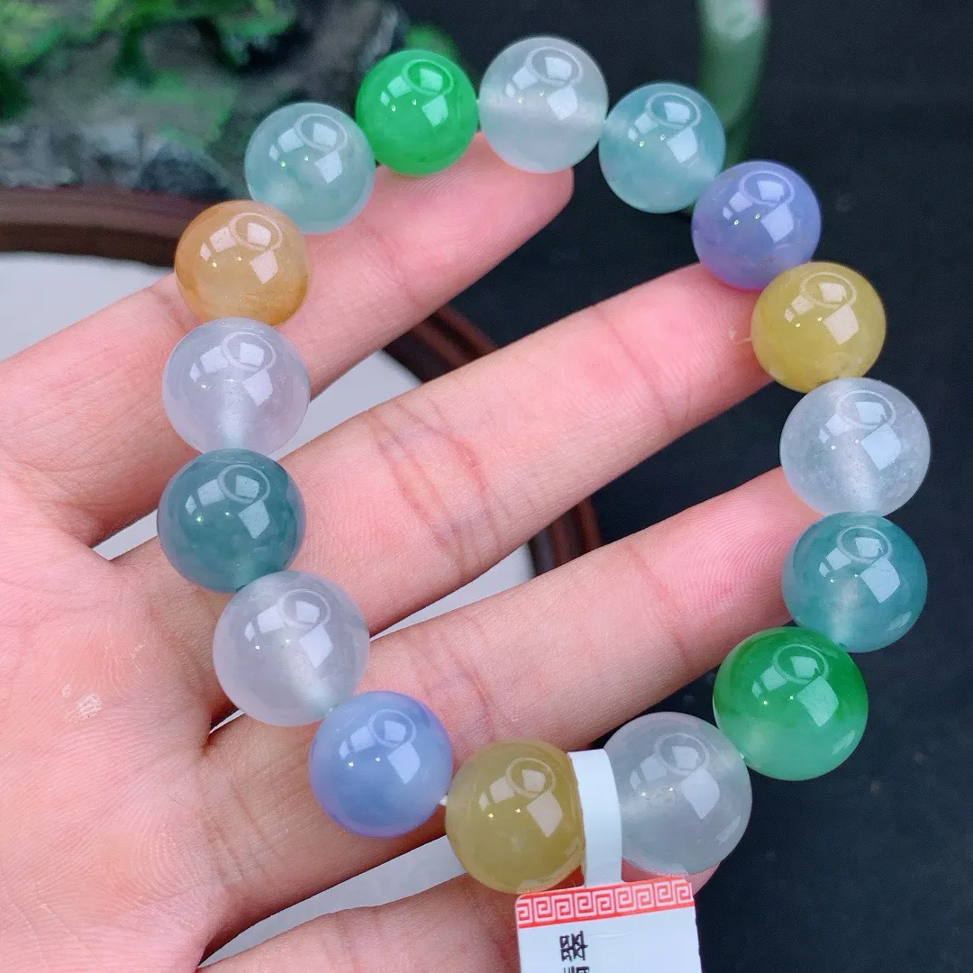 冰满色多宝起胶圆珠手串
尺寸12.8mm   重59.02g