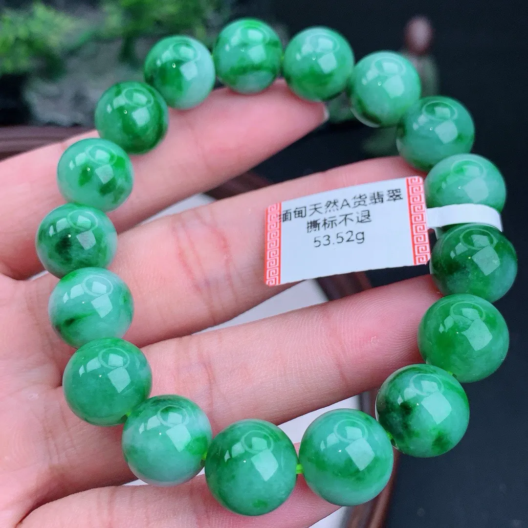 缅甸天然A货翡翠满绿圆珠手串
尺寸12mm  重53.52g