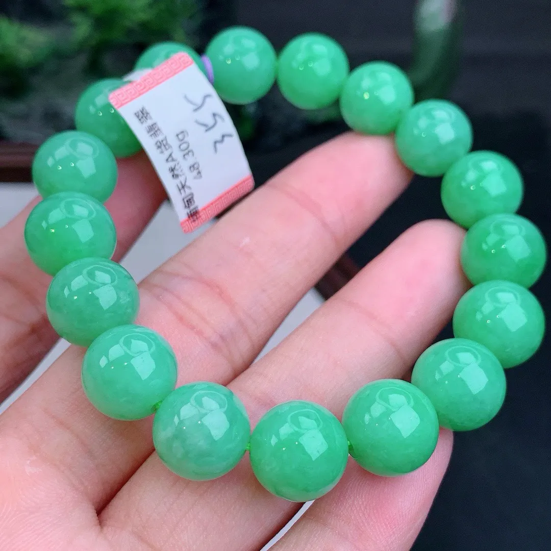 缅甸天然A货翡翠满绿圆珠手串 
尺寸11.6mm   重48.30g