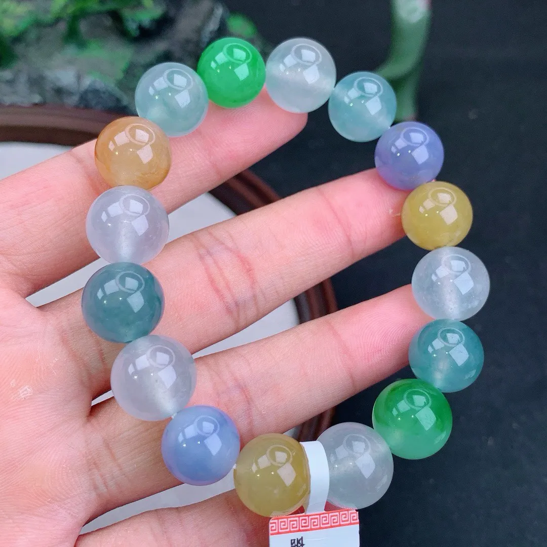 冰满色多宝起胶圆珠手串
尺寸12.8mm   重59.02g
