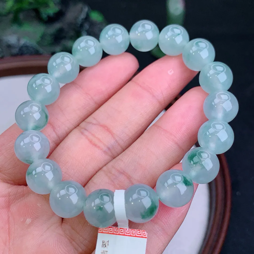 缅甸天然A货翡翠冰飘花圆珠手串
尺寸10.7mm   重41.02g