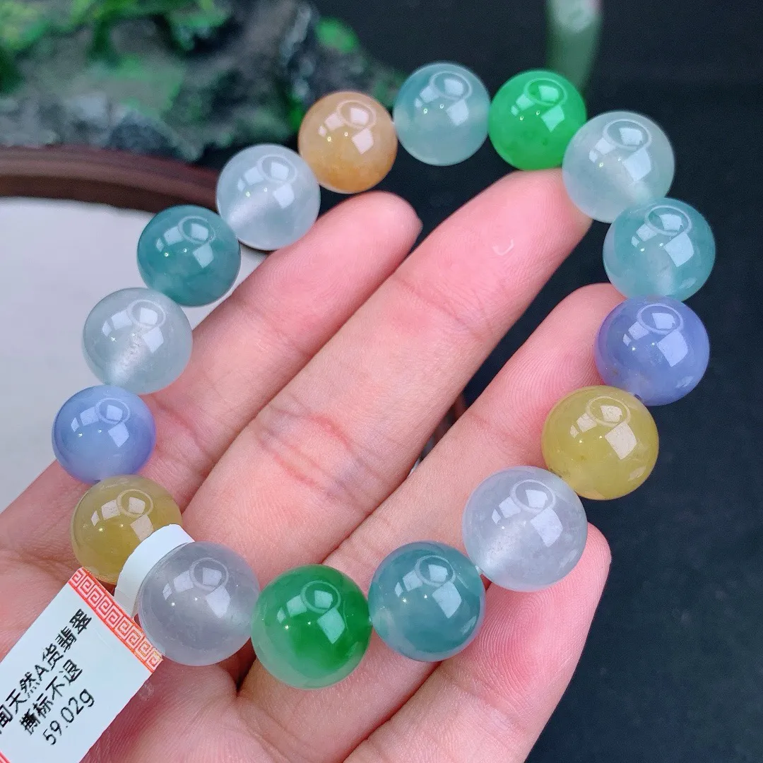 冰满色多宝起胶圆珠手串
尺寸12.8mm   重59.02g