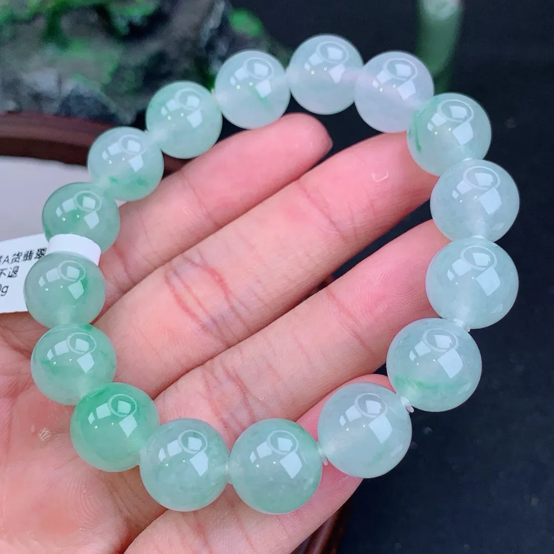 缅甸天然A货冰飘绿圆珠手串
尺寸12.6mm   重56.00g