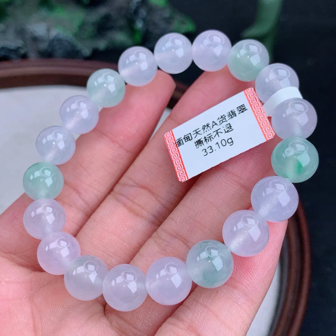 缅甸天然A货翡翠冰多宝圆珠手串
尺寸10mm  重33.10g