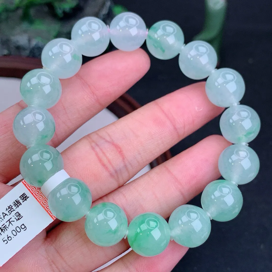 缅甸天然A货冰飘绿圆珠手串
尺寸12.6mm   重56.00g