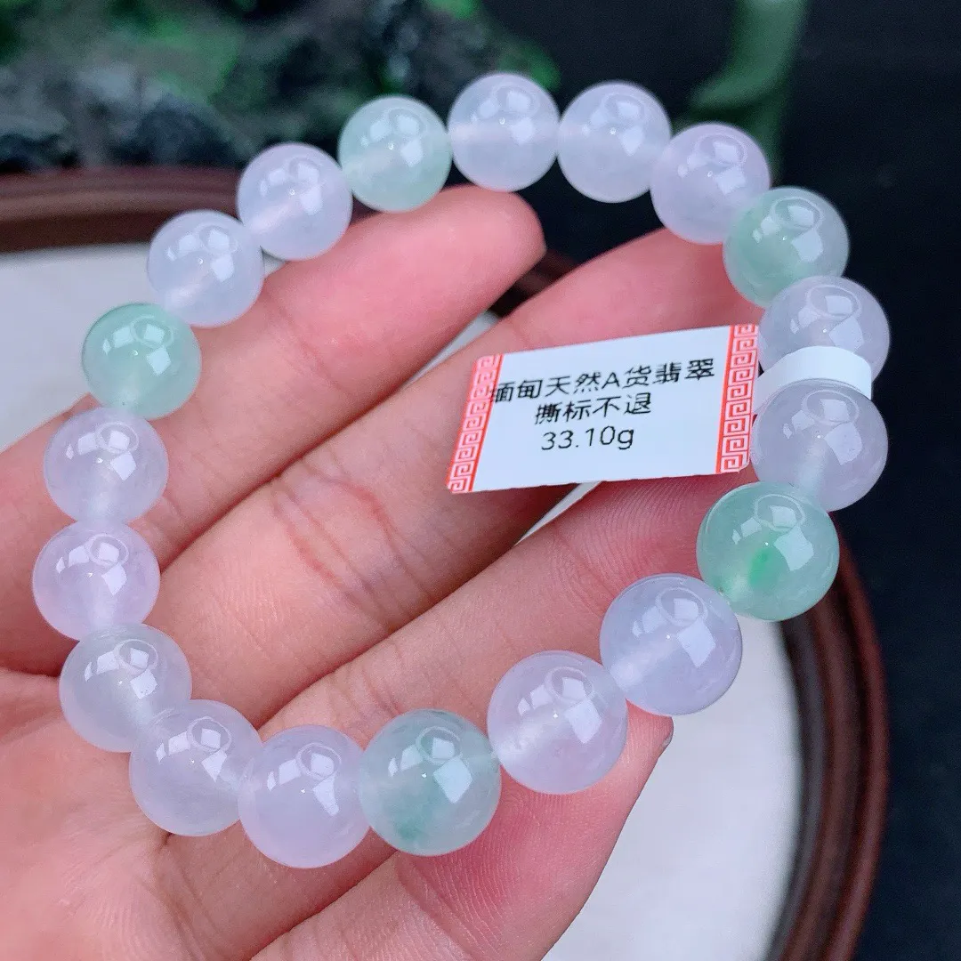 缅甸天然A货翡翠冰多宝圆珠手串
尺寸10mm  重33.10g