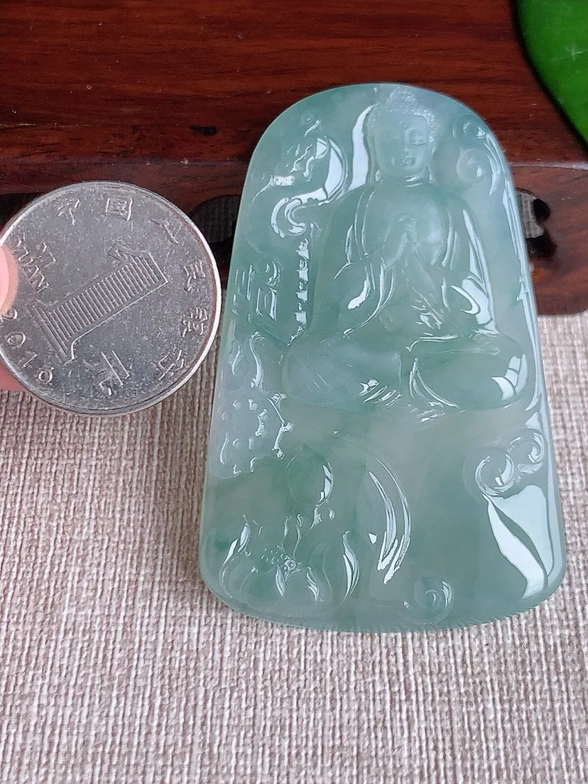a货翡翠老坑冰种飘花大日如来吊坠 尺寸59.3×37.6×5.2mm 重量26.58g 0604