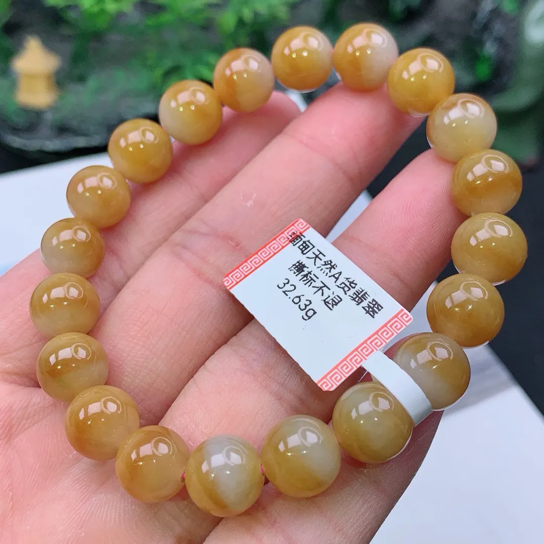 缅甸天然A货翡翠黄翡圆珠手串
尺寸10mm  重32.63g