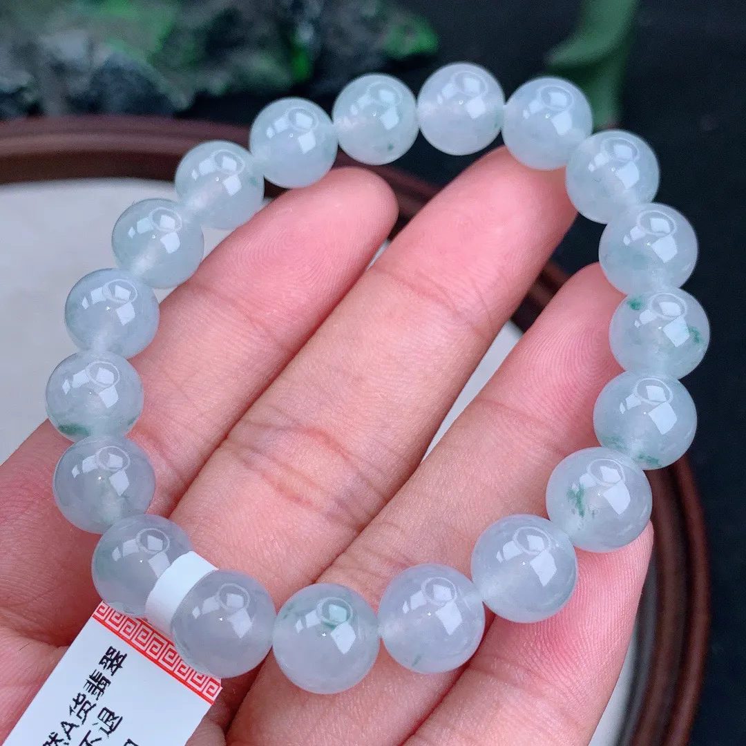 缅甸天然A货翡翠冰飘花圆珠手串
尺寸9.7mm   重31.75g