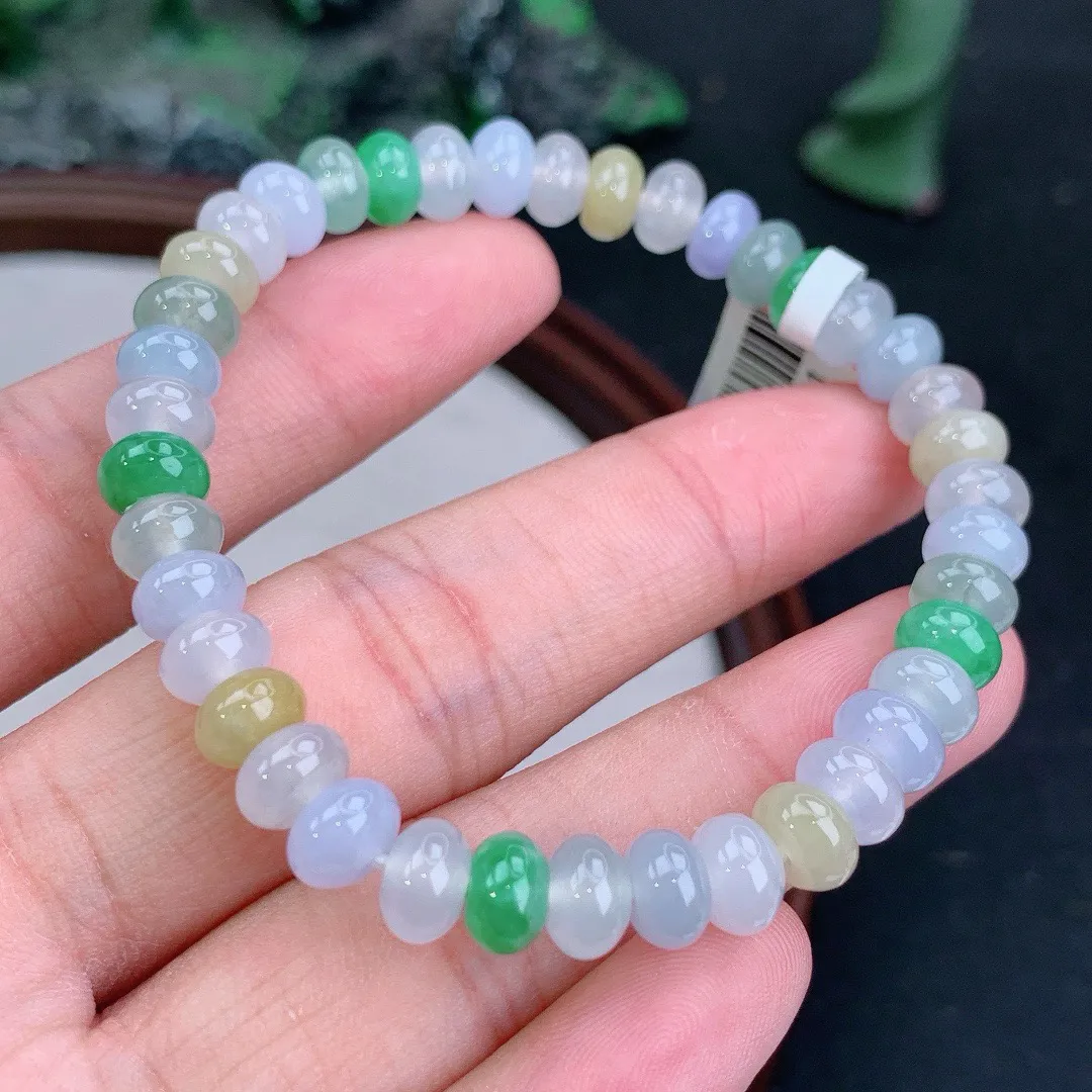 缅甸天然A货翡翠冰多宝算盘珠手串
尺寸7.3-4.8mm  重18.02g