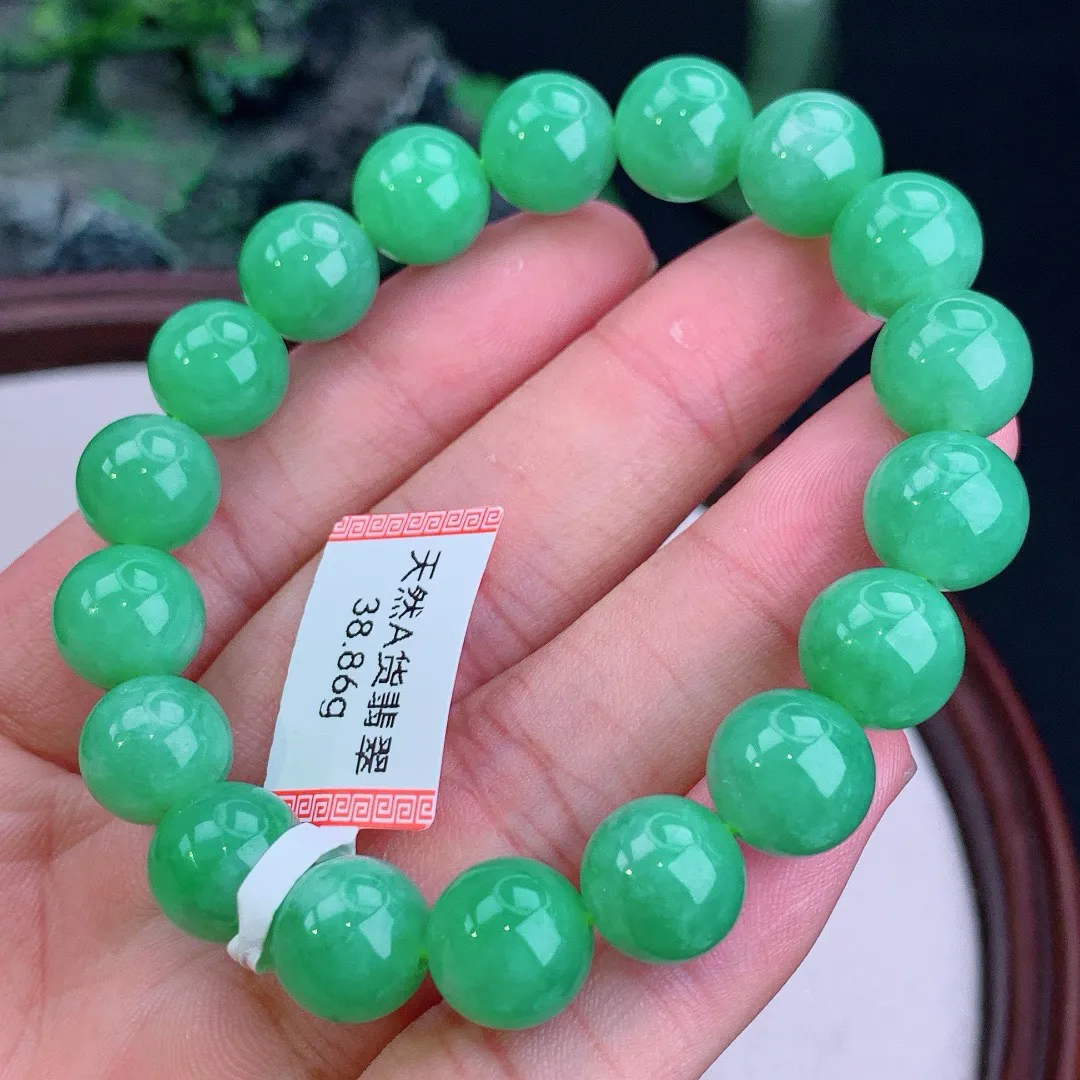 缅甸天然A货翡翠满绿圆珠手串
尺寸10.8mm   重38.86g