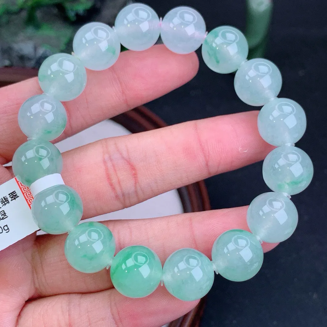 缅甸天然A货冰飘绿圆珠手串
尺寸12.6mm   重56.00g