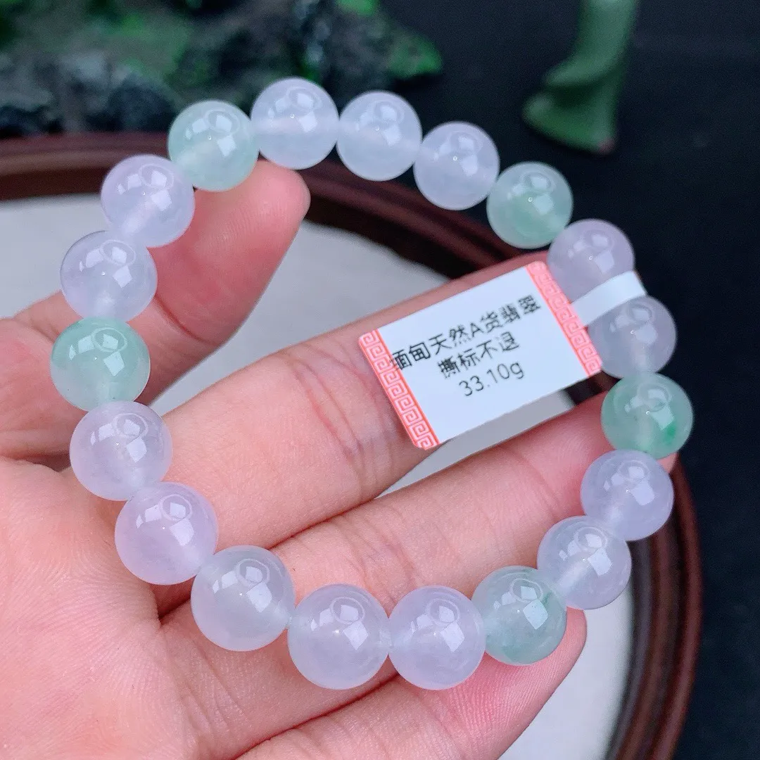 缅甸天然A货翡翠冰多宝圆珠手串
尺寸10mm  重33.10g