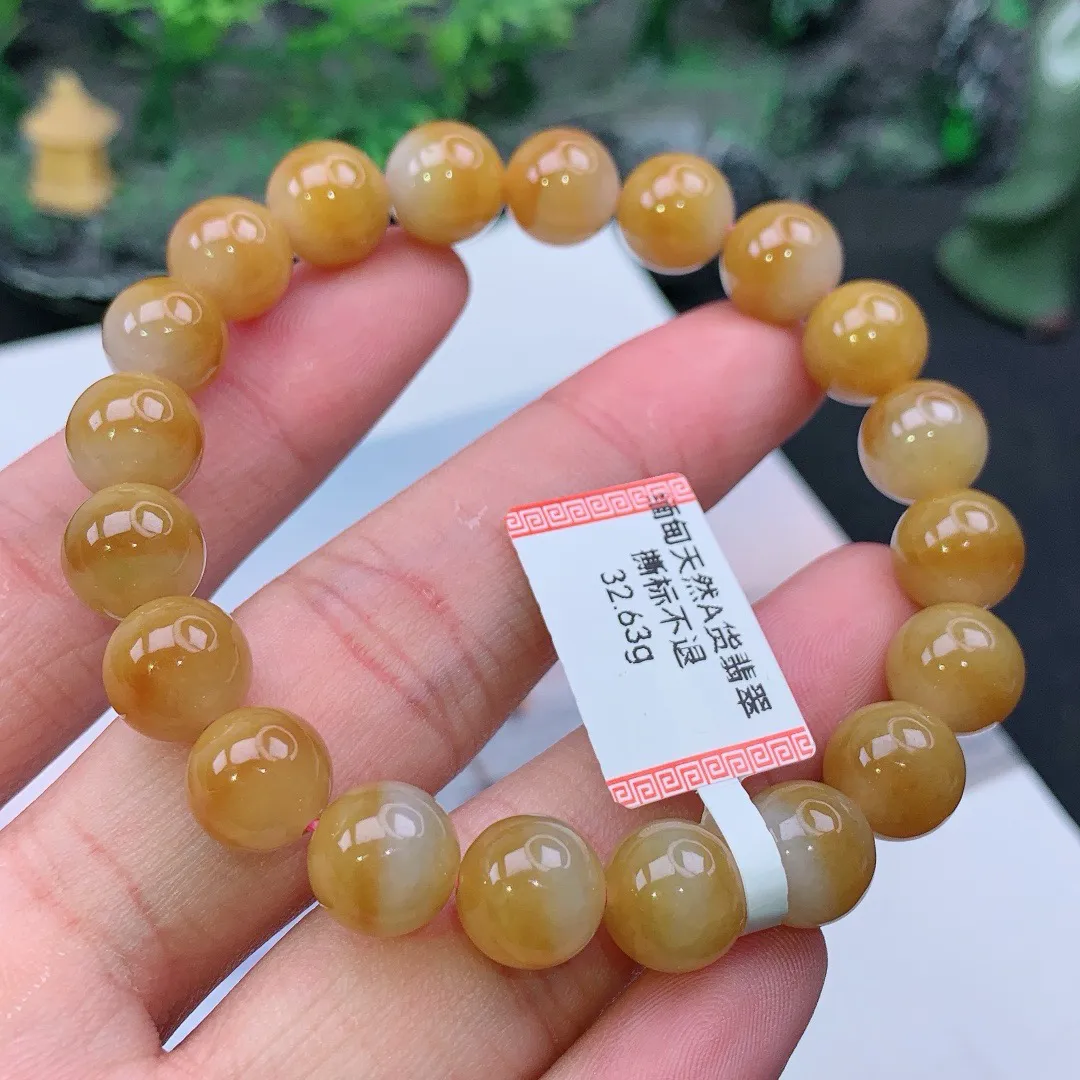 缅甸天然A货翡翠黄翡圆珠手串
尺寸10mm  重32.63g
