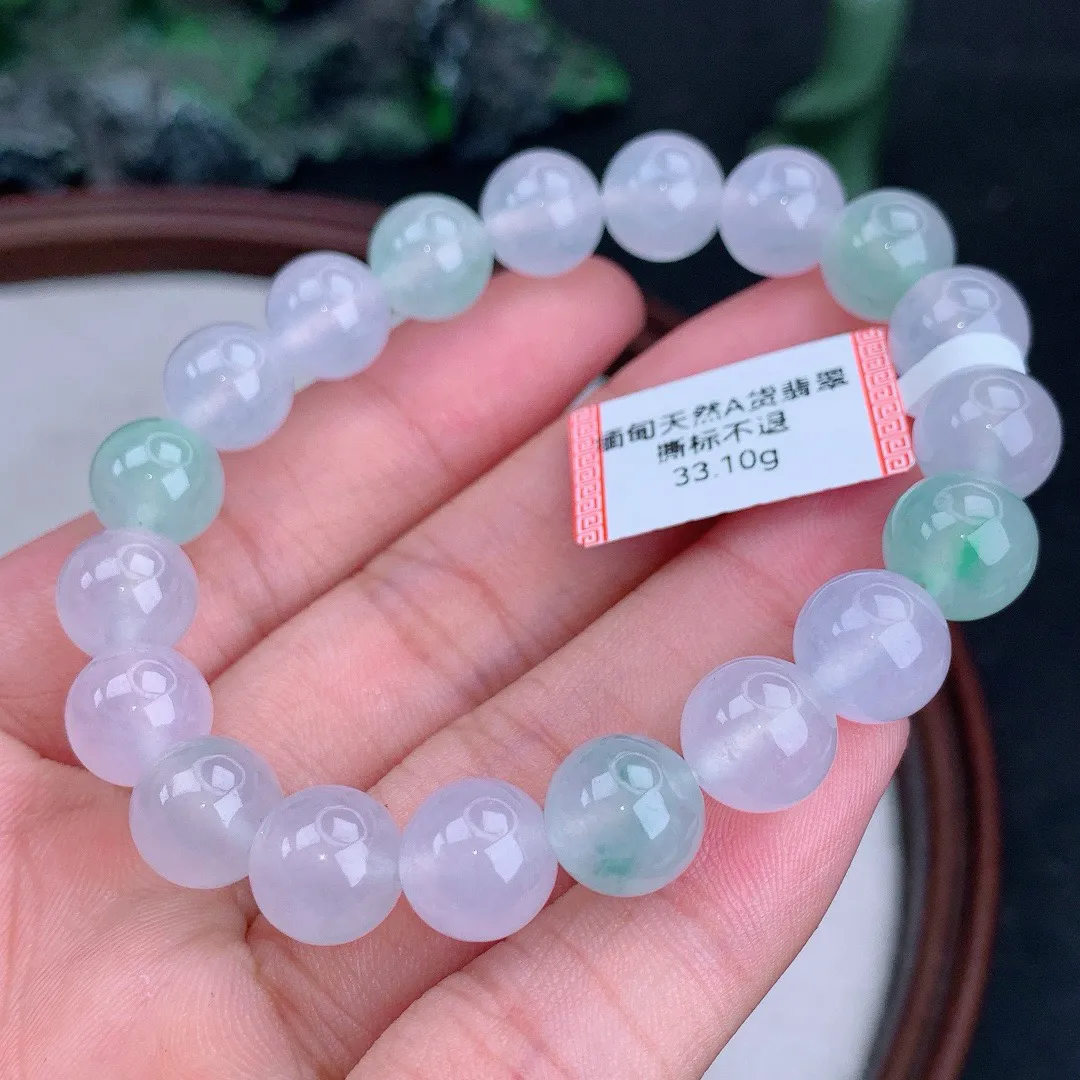 缅甸天然A货翡翠冰多宝圆珠手串
尺寸10mm  重33.10g