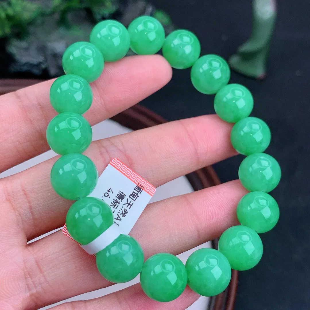缅甸天然A货翡翠满绿圆珠手串
尺寸11.4mm  重46.47g