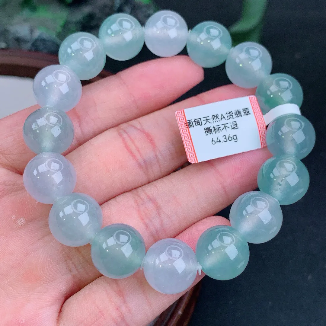 缅甸天然A货翡翠冰晴起胶圆珠手串
尺寸13.2mm   重64.36g