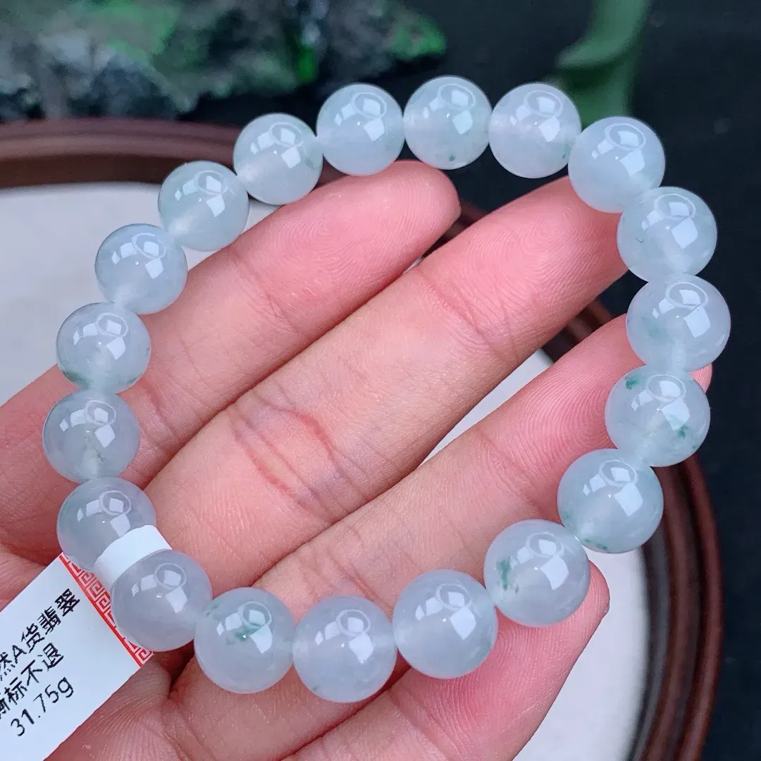 缅甸天然A货翡翠冰飘花圆珠手串
尺寸9.7mm   重31.75g