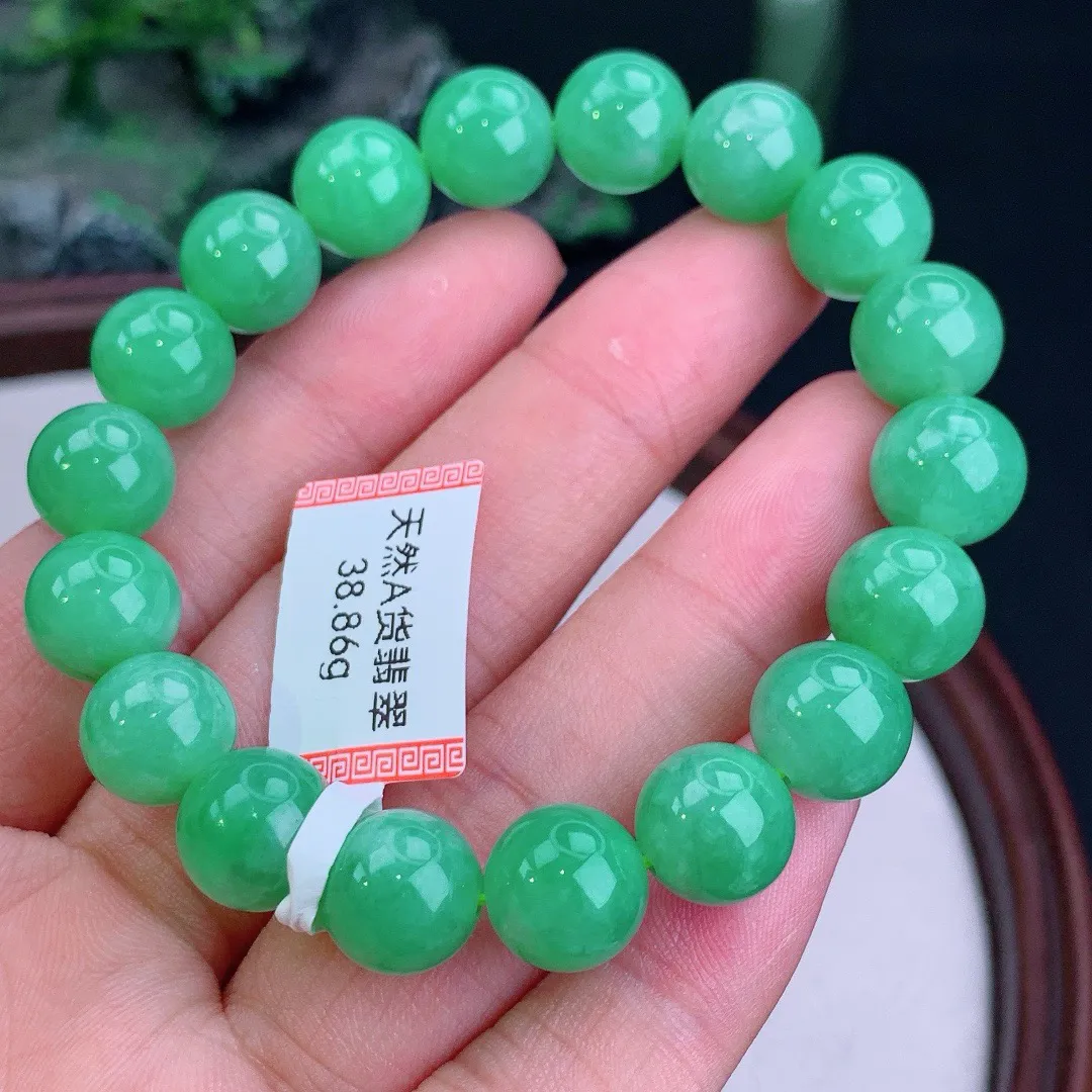 缅甸天然A货翡翠满绿圆珠手串
尺寸10.8mm   重38.86g