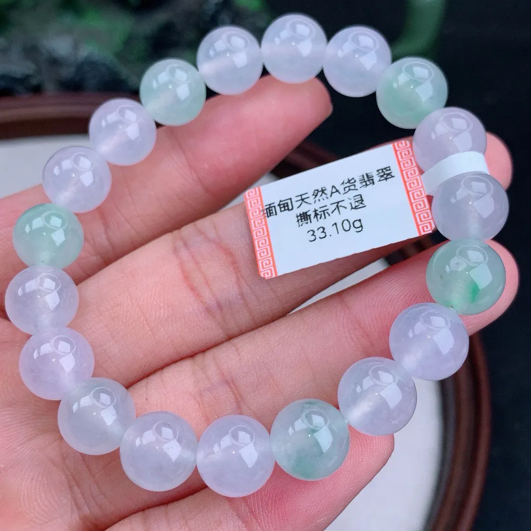 缅甸天然A货翡翠冰多宝圆珠手串
尺寸10mm  重33.10g