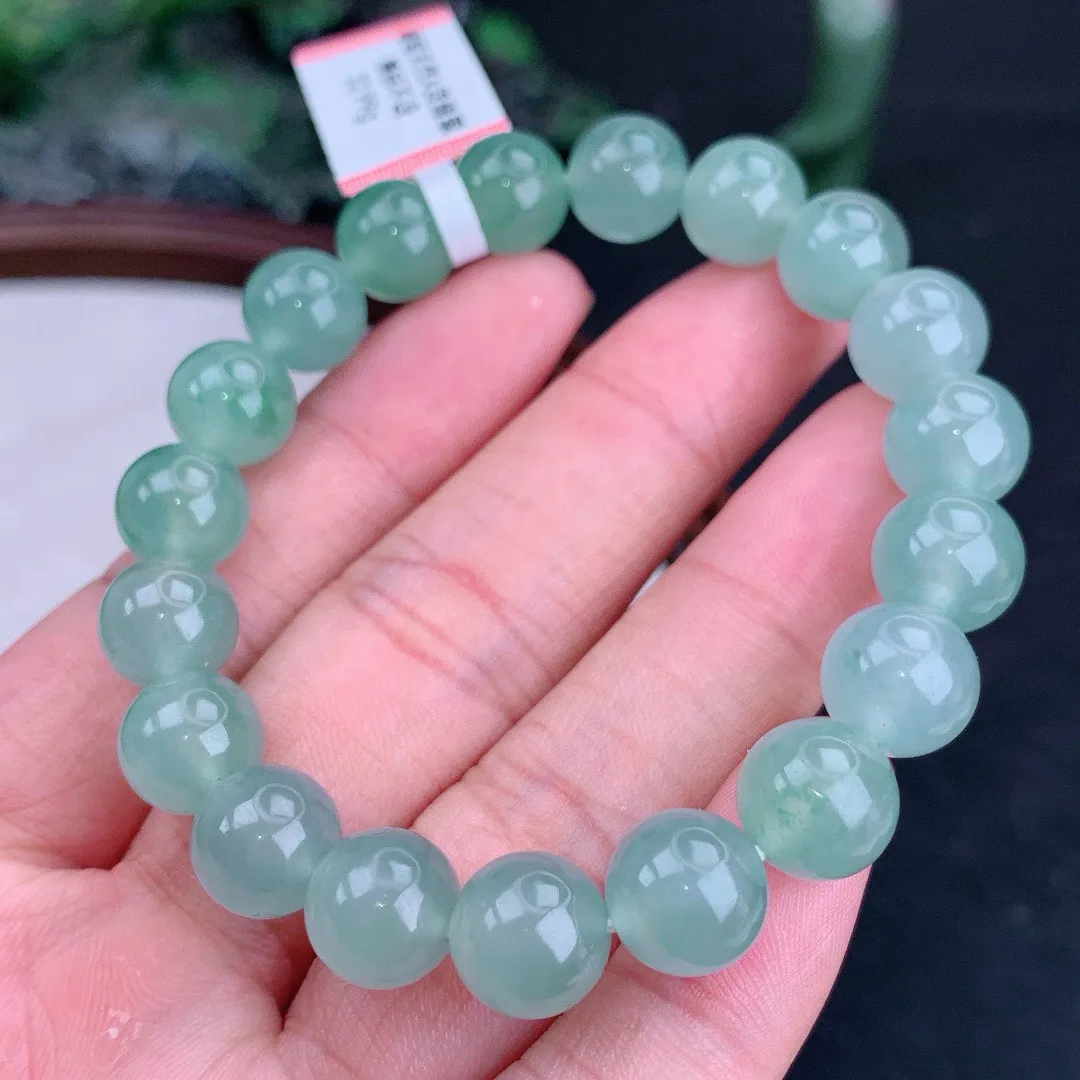 天然A货翡翠冰晴飘花圆珠手串
尺寸9.5mm  重32.99g