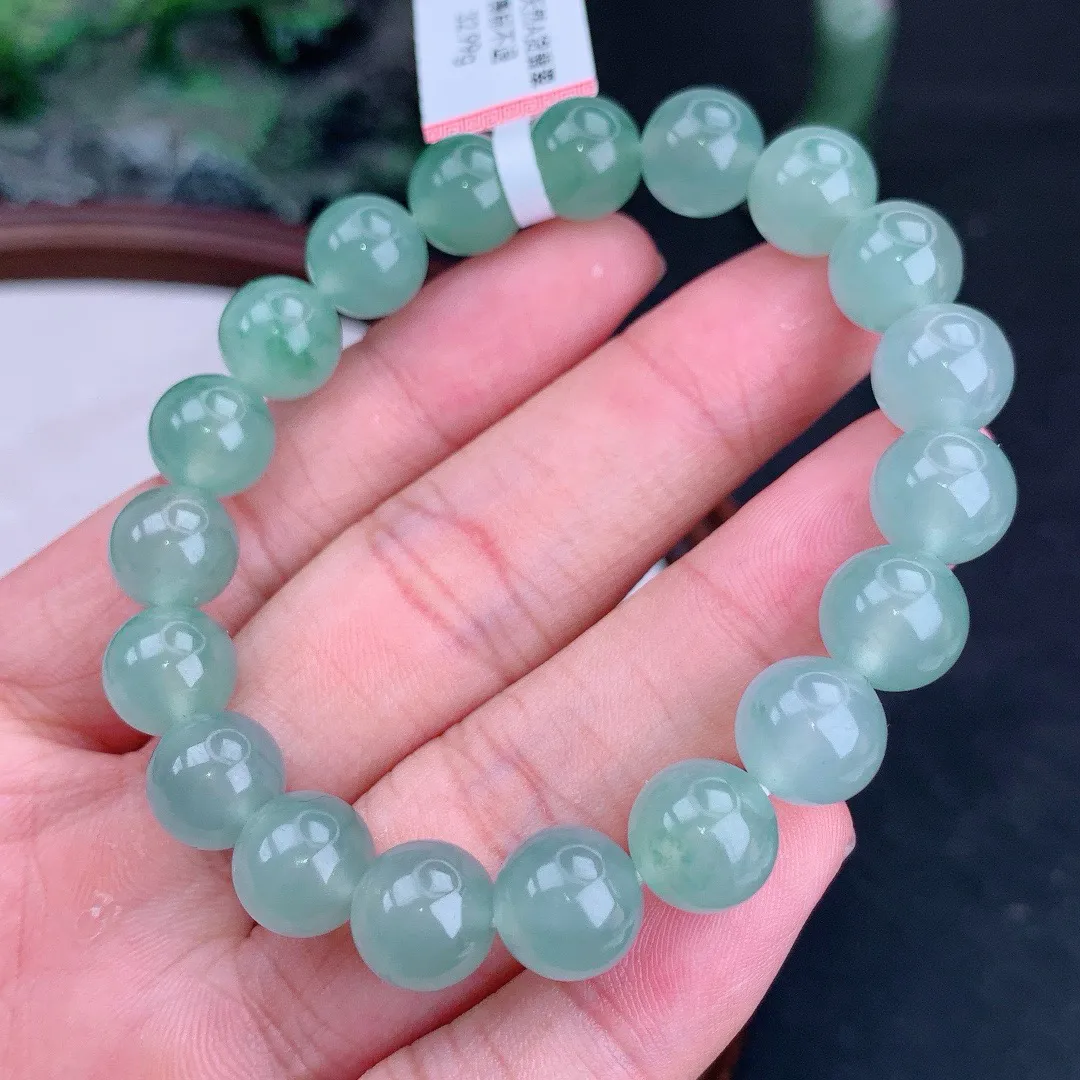 天然A货翡翠冰晴飘花圆珠手串
尺寸9.5mm  重32.99g