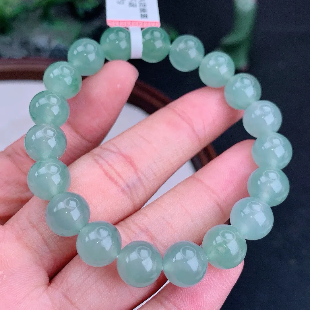 天然A货翡翠冰晴飘花圆珠手串
尺寸9.5mm  重32.99g