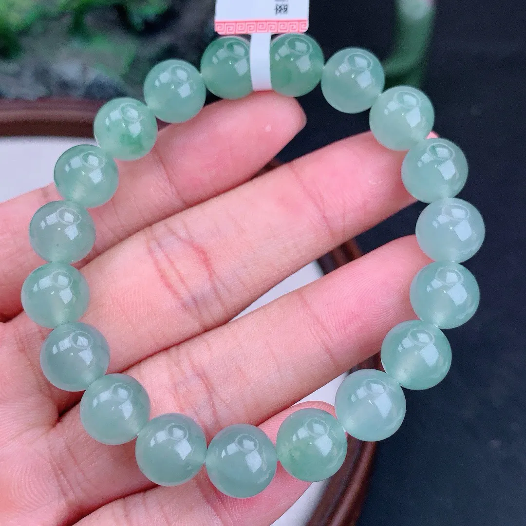 天然A货翡翠冰晴飘花圆珠手串
尺寸9.5mm  重32.99g