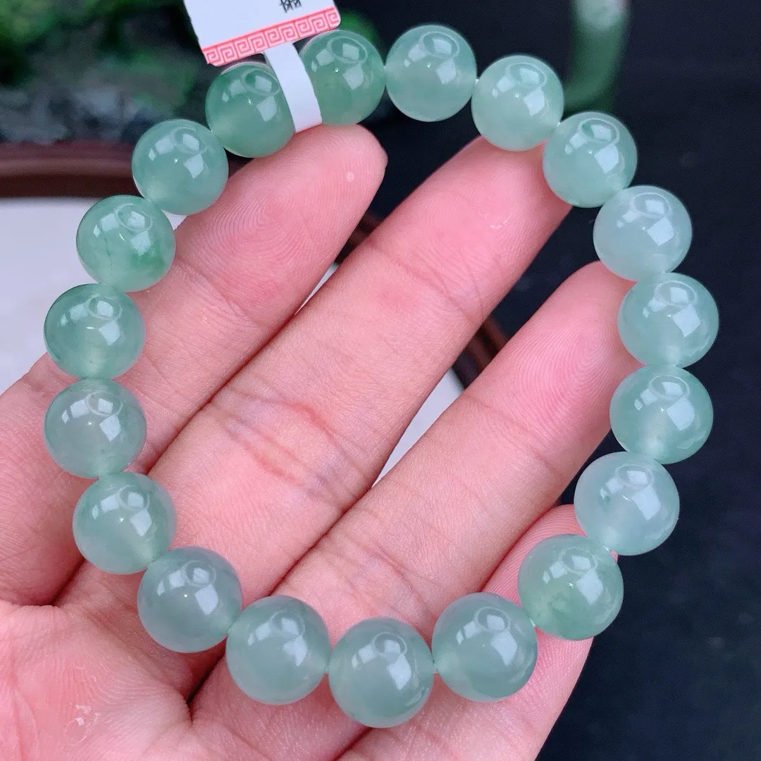 天然A货翡翠冰晴飘花圆珠手串
尺寸9.5mm  重32.99g