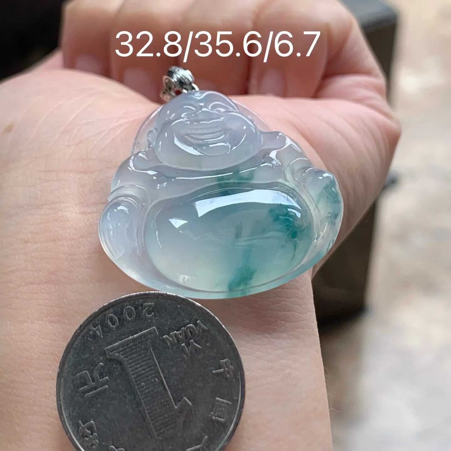 冰种飘花坐佛
大气 金扣